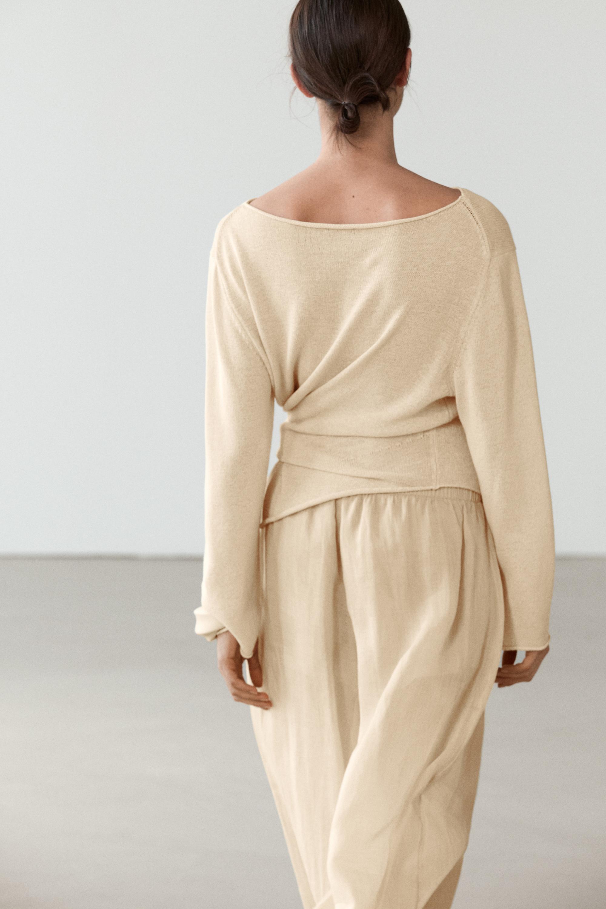 Asymmetric linen blend sweater with tie detail